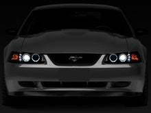 Cargar imagen en el visor de la galería, Raxiom 99-04 Ford Mustang Dual LED Halo Projector Headlights- Black Housing (Smoked Lens)